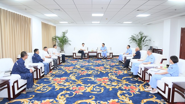 中電建河南工程有限公司黨委書記、董事長劉長龍一行到萬基控股集團交流訪談